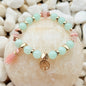 Mint Blossom Armband – Mintgrüne Natursteinperlen mit Lebensbaum-Anhänger und Quaste