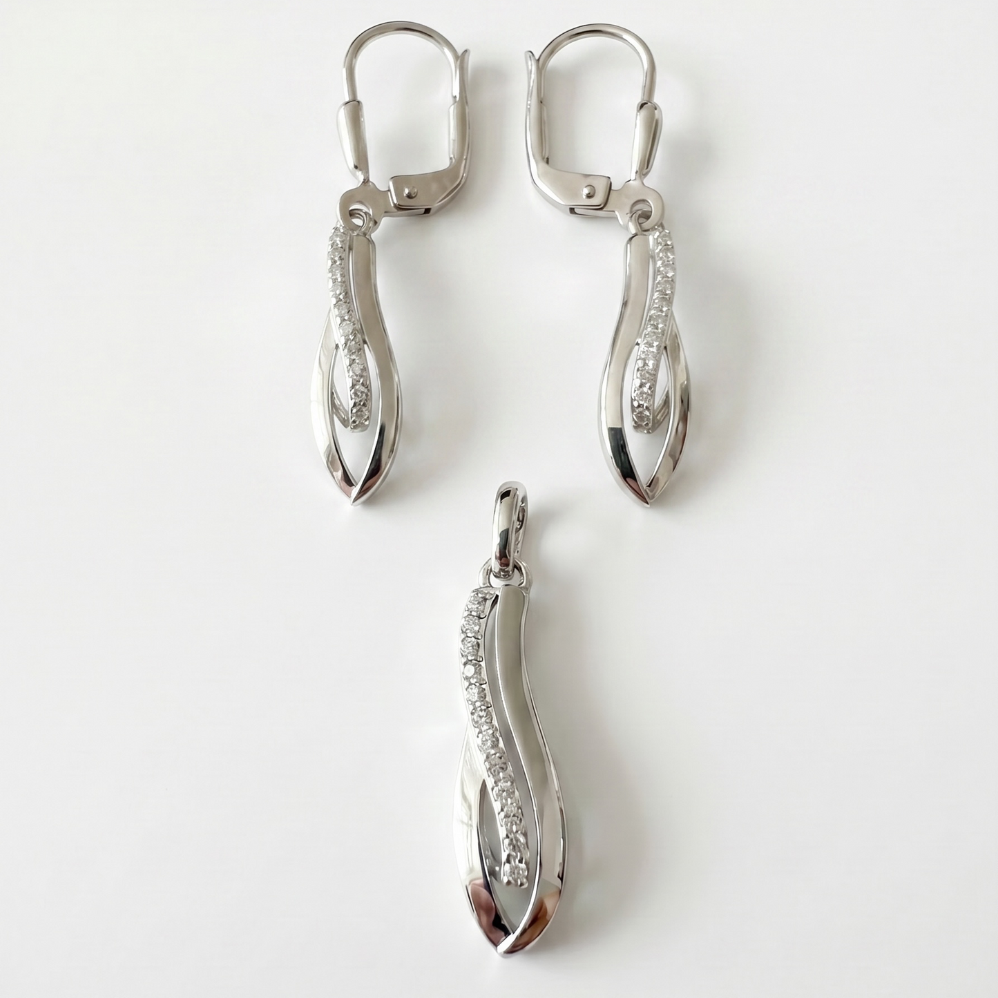 925 Silber Schmuckset mit Zirkonium im Wellen-Design – Anhänger und Ohrringe