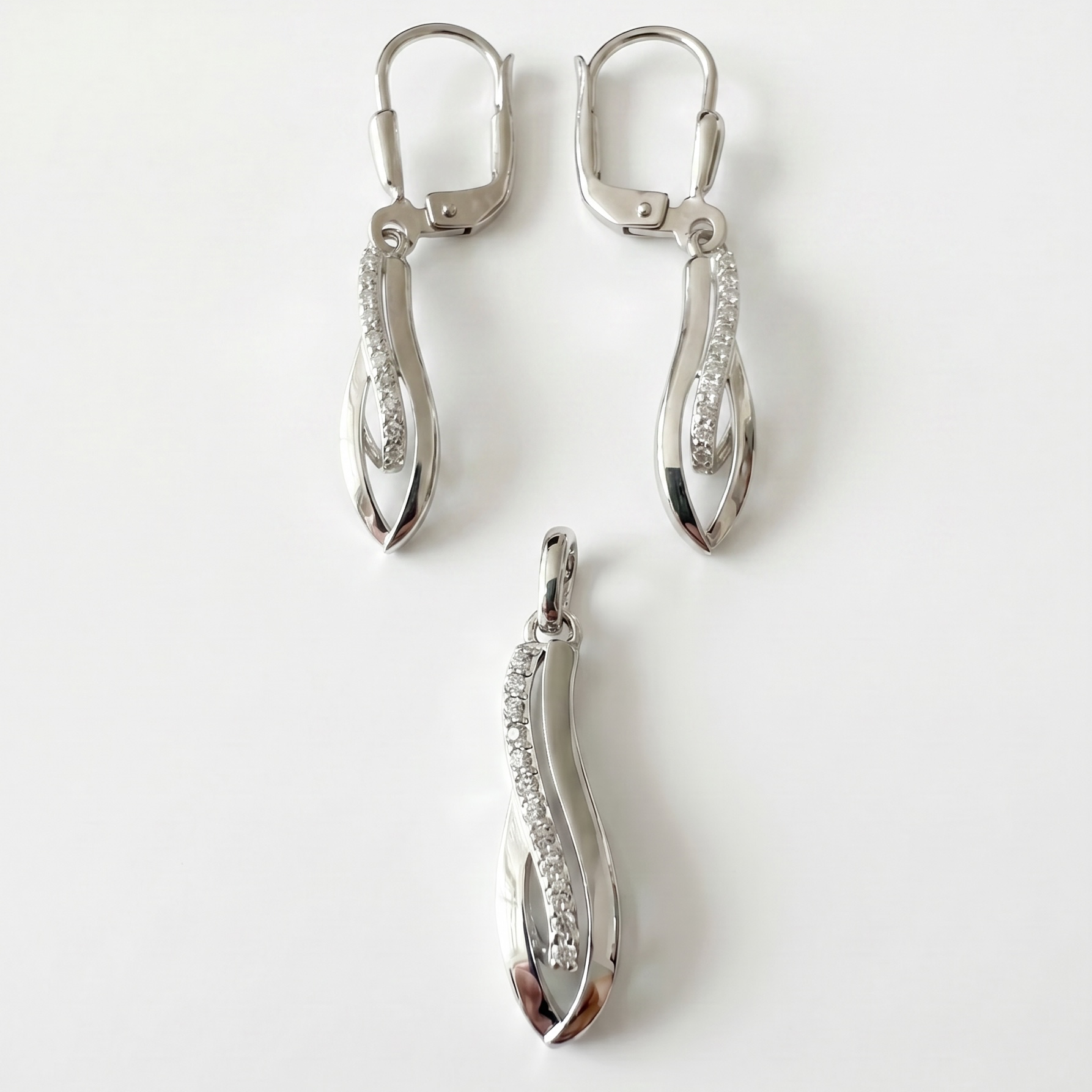 925 Silber Schmuckset mit Zirkonium im Wellen-Design – Anhänger und Ohrringe