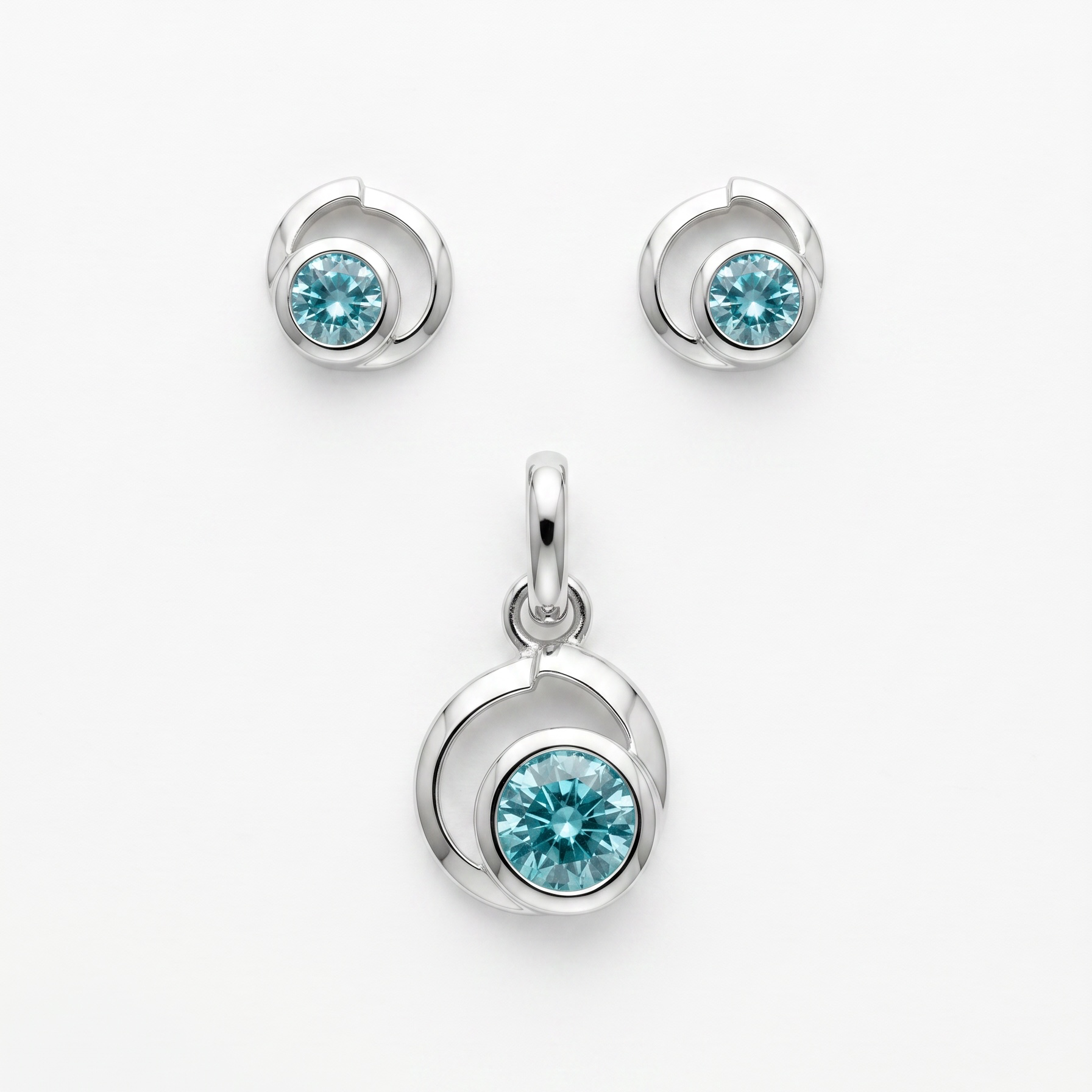 925 Silber Schmuckset mit Zirkonium Hellblau im Spiralen-Design – Anhänger und Ohrringe