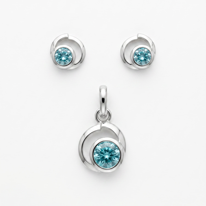 925 Silber Schmuckset mit Zirkonium Hellblau im Spiralen-Design – Anhänger und Ohrringe